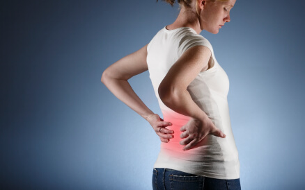 an image of a woman with low back pain